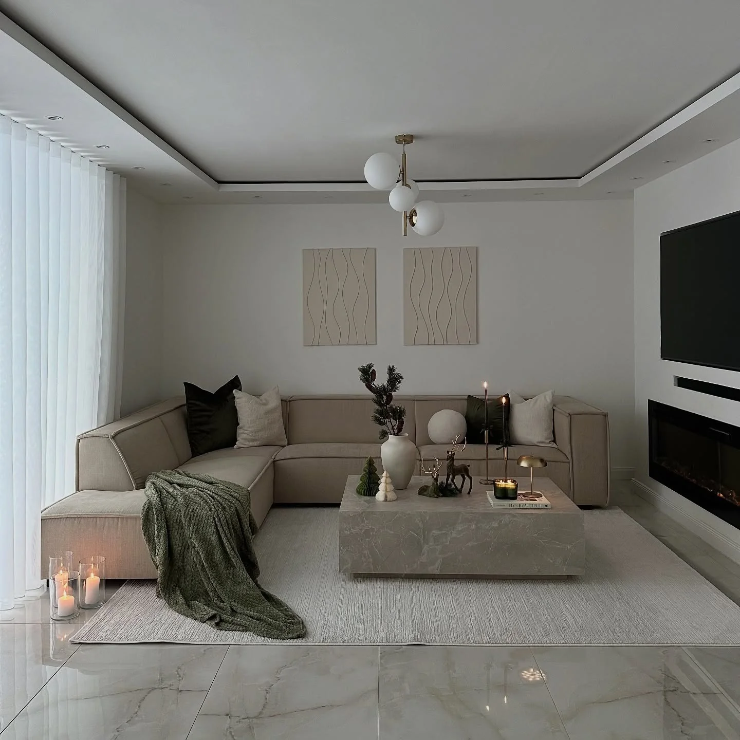 7. Muted Elegance with Subtle Green (Warm and Cozy Living Room Ideas)