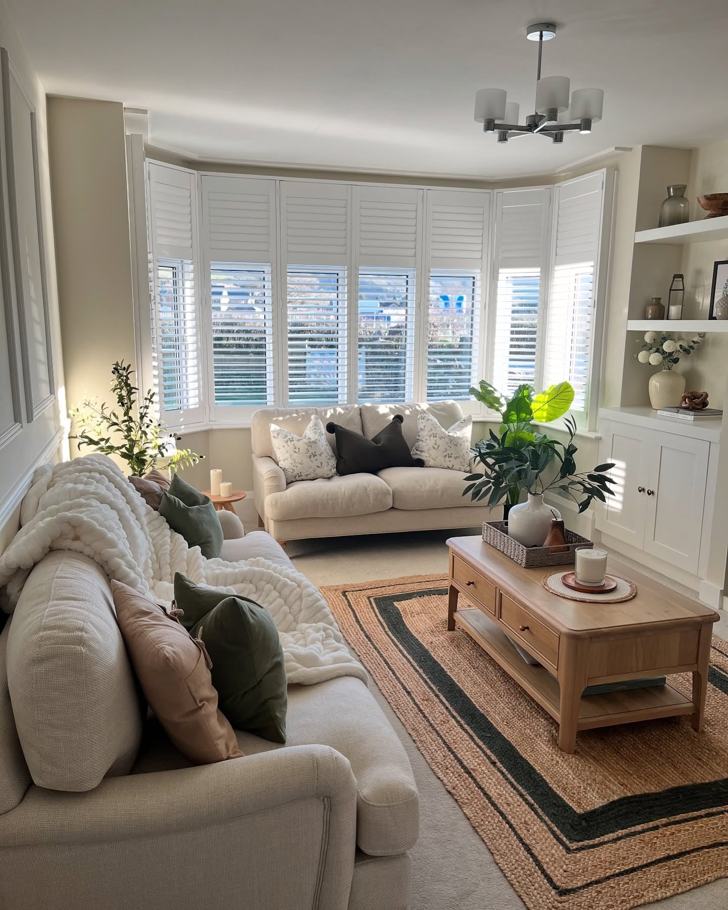 12. Fresh Neutrals with Botanical Touches (Warm and Cozy Living Room Ideas)