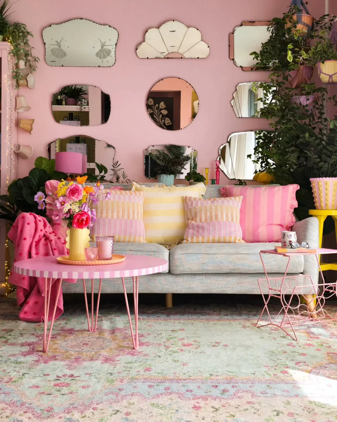 4. Playful Patterns and Mirror Gallery Charm (Pink Living Room Ideas)