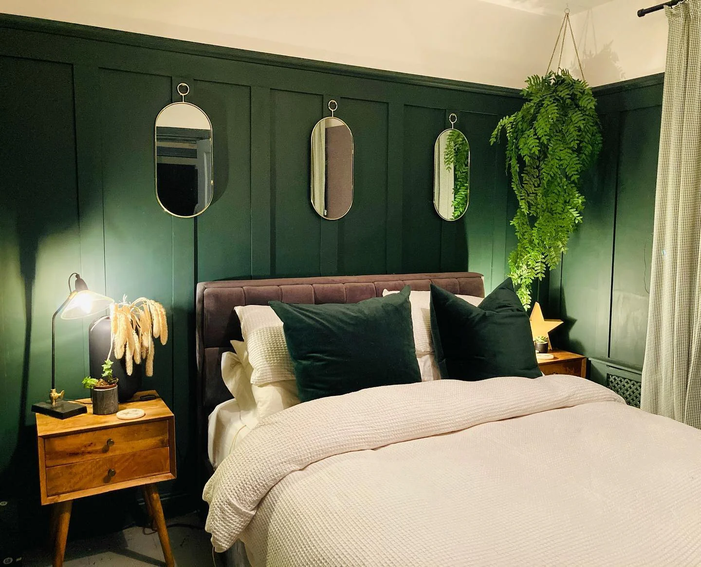 12. Midcentury Mood with Deep Green Paneling (Dark Green Bedroom Ideas)