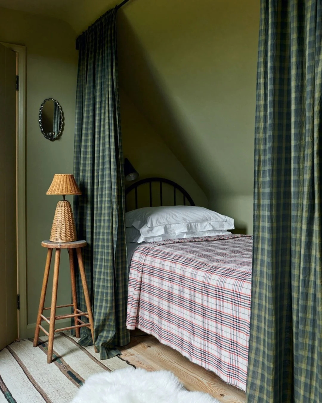 20. Rustic Charm in Mossy Green and Plaid (Dark Green Bedroom Ideas)