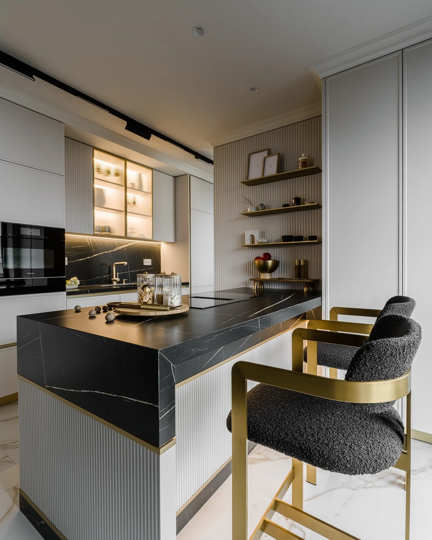 5. Modern Glamour with Black Marble and Brass Detailing (classic kitchen ideas)