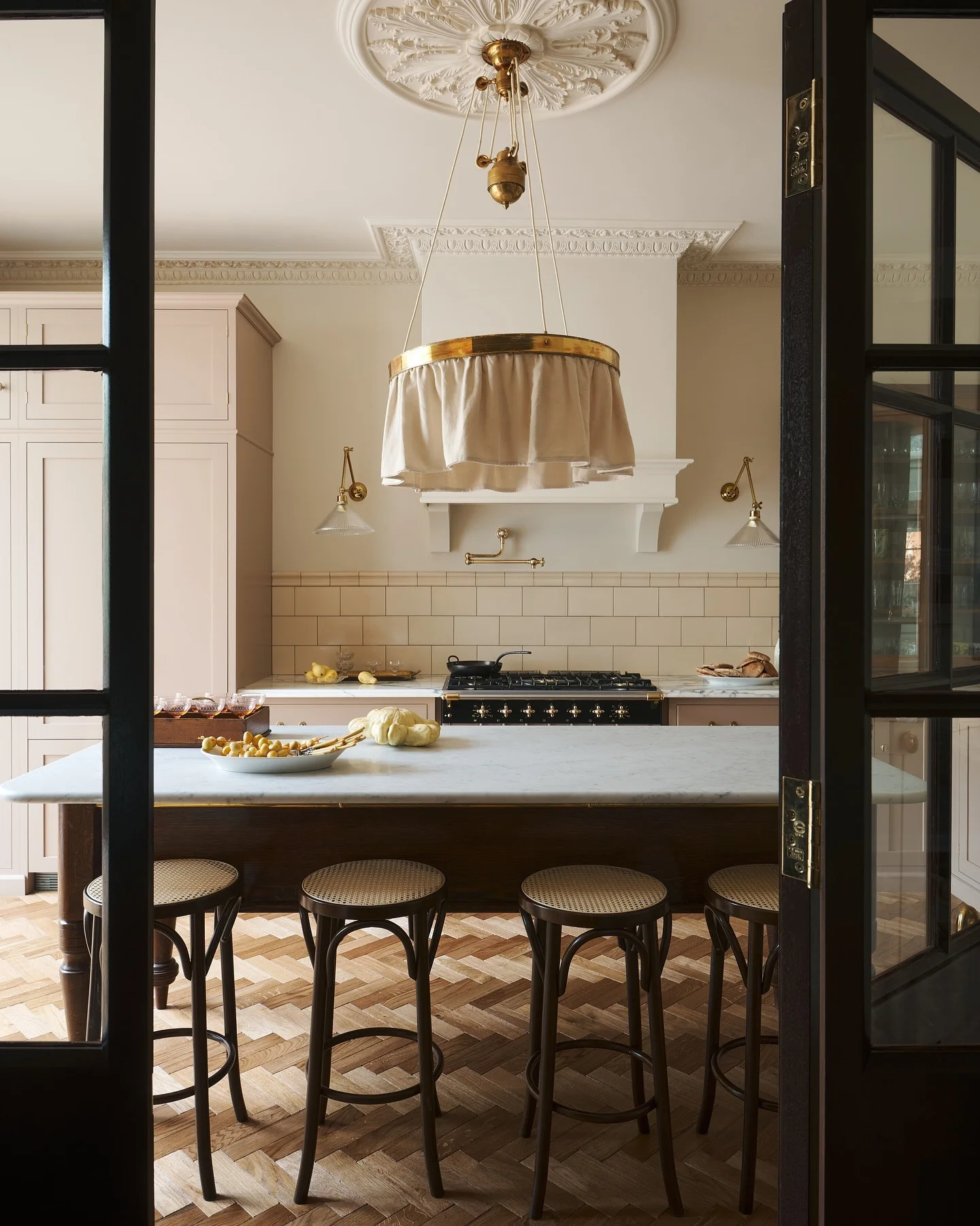 16. Traditional Glamour with Ornate Ceiling and Pleated Light Fixture (classic kitchen ideas)