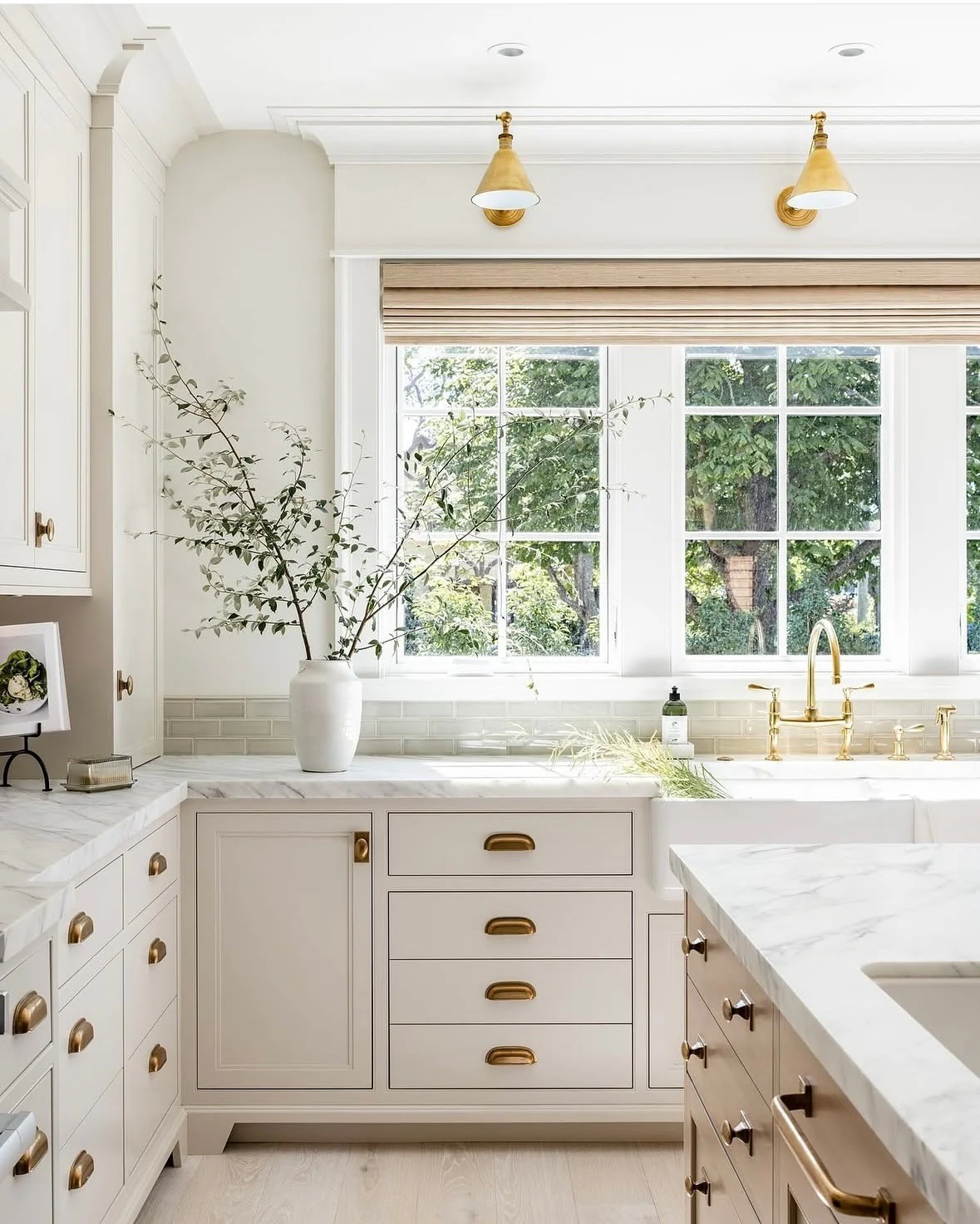 18. Bright and Polished with Cream Cabinets and Classic Fixtures (classic kitchen ideas)