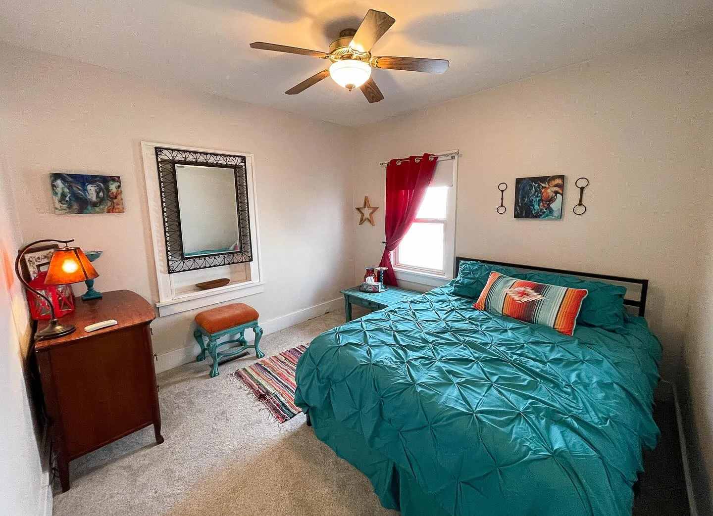 2. Eclectic Charm with Bold Red Accents (Turquoise Bedroom Ideas)