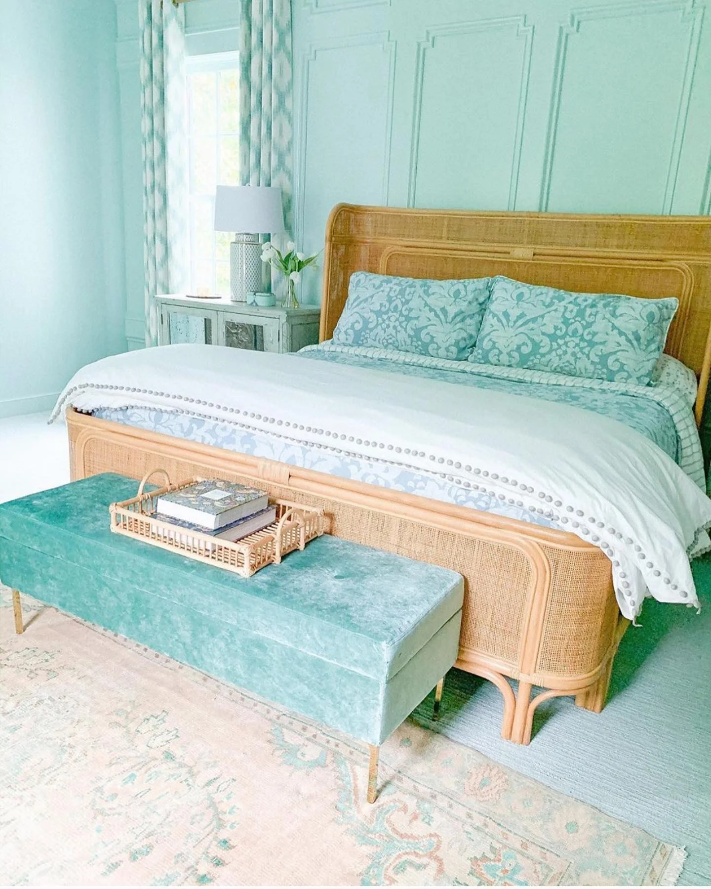 7. Monochrome Serenity with Rattan Accents (Turquoise Bedroom Ideas)