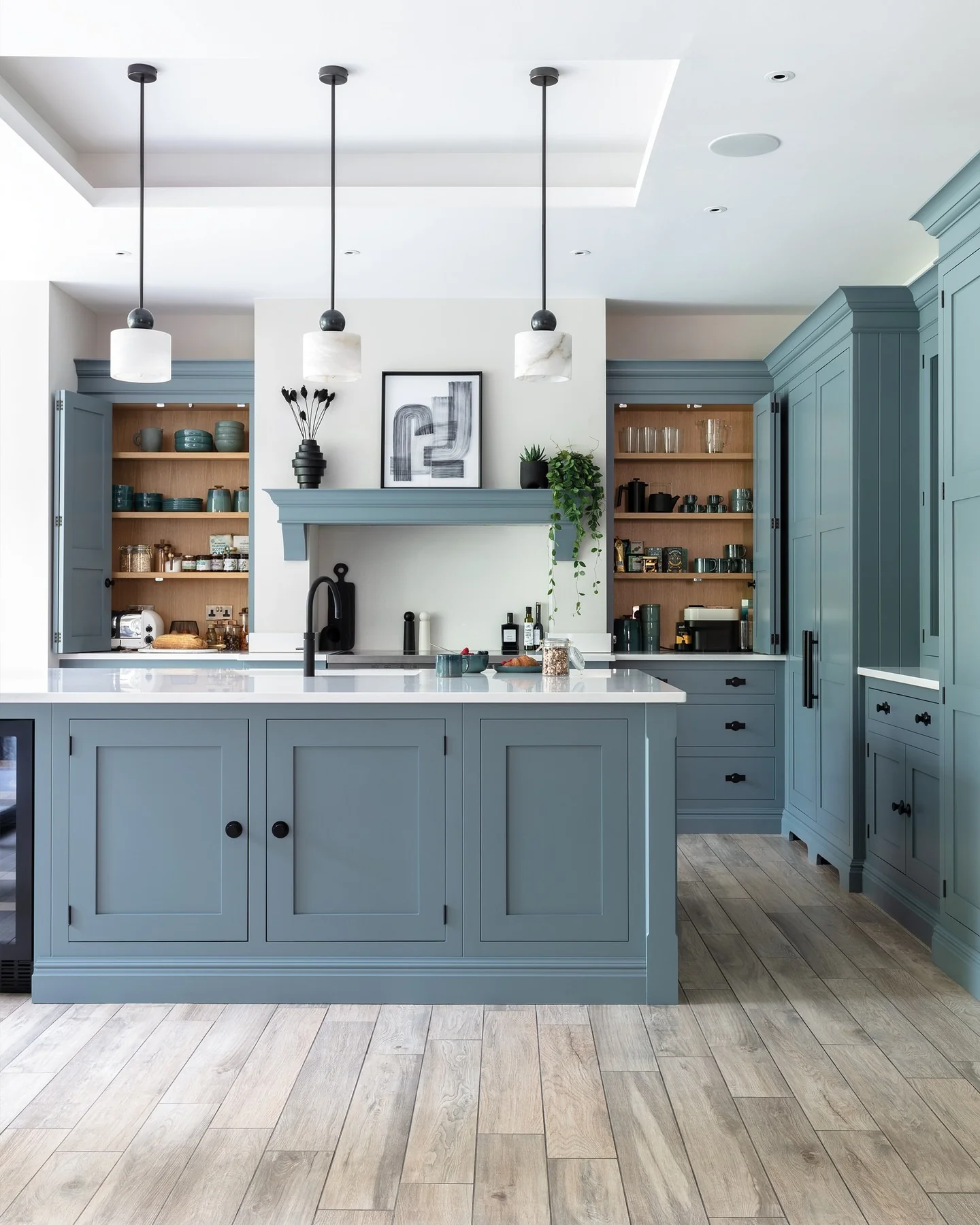 9. Powder Blue Hidden Pantry Kitchen (Unique Kitchen Ideas)