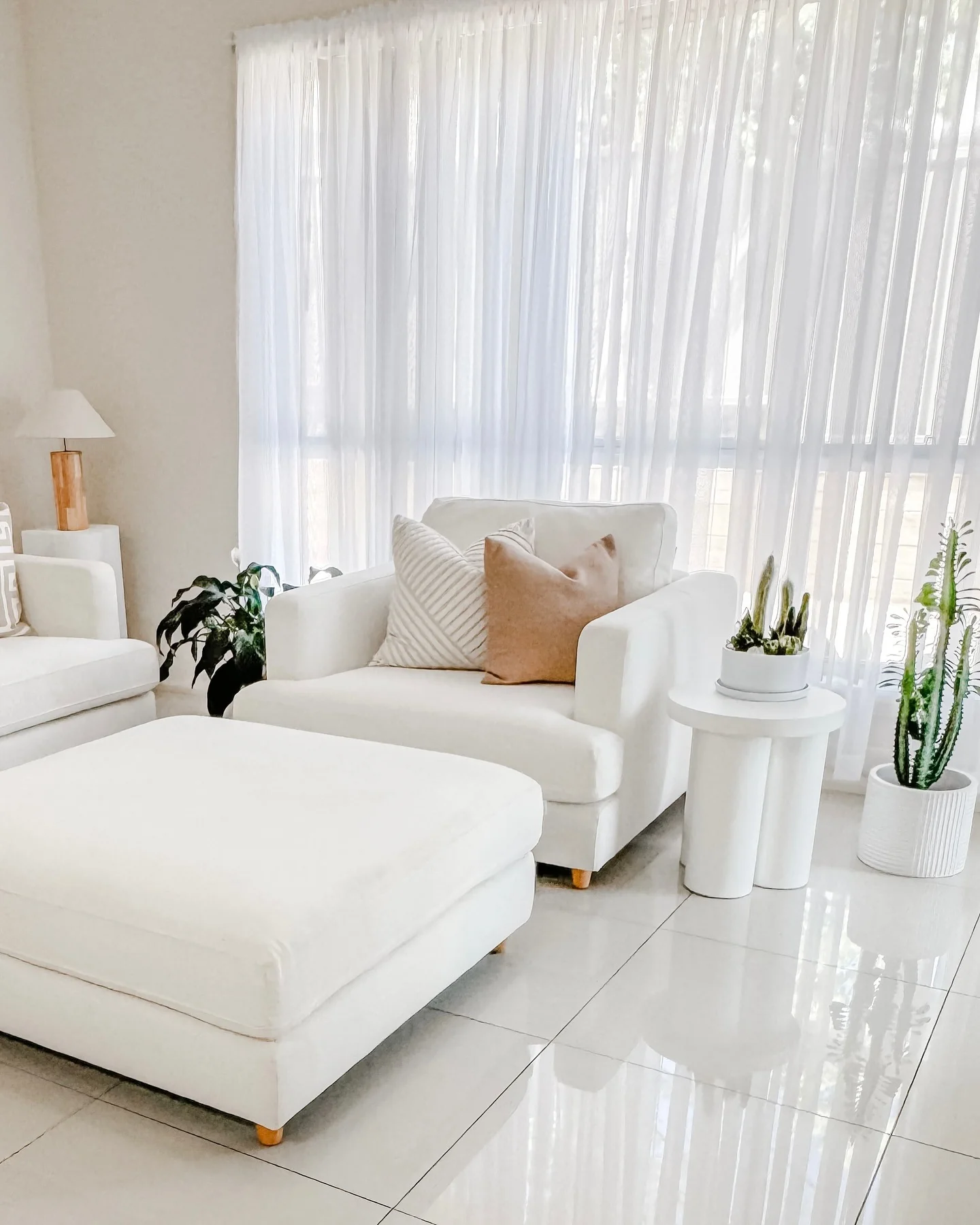 5. Soft Contemporary with Natural Light (White Living Room Ideas)