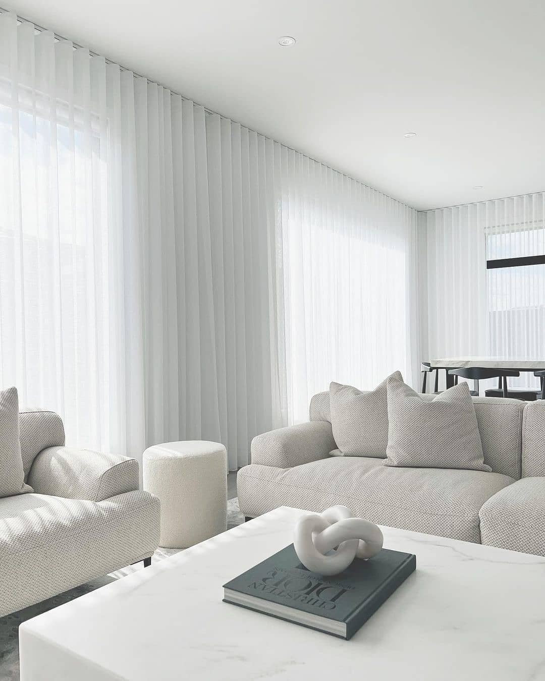 12. Soft Monochrome with Architectural Flow (White Living Room Ideas)