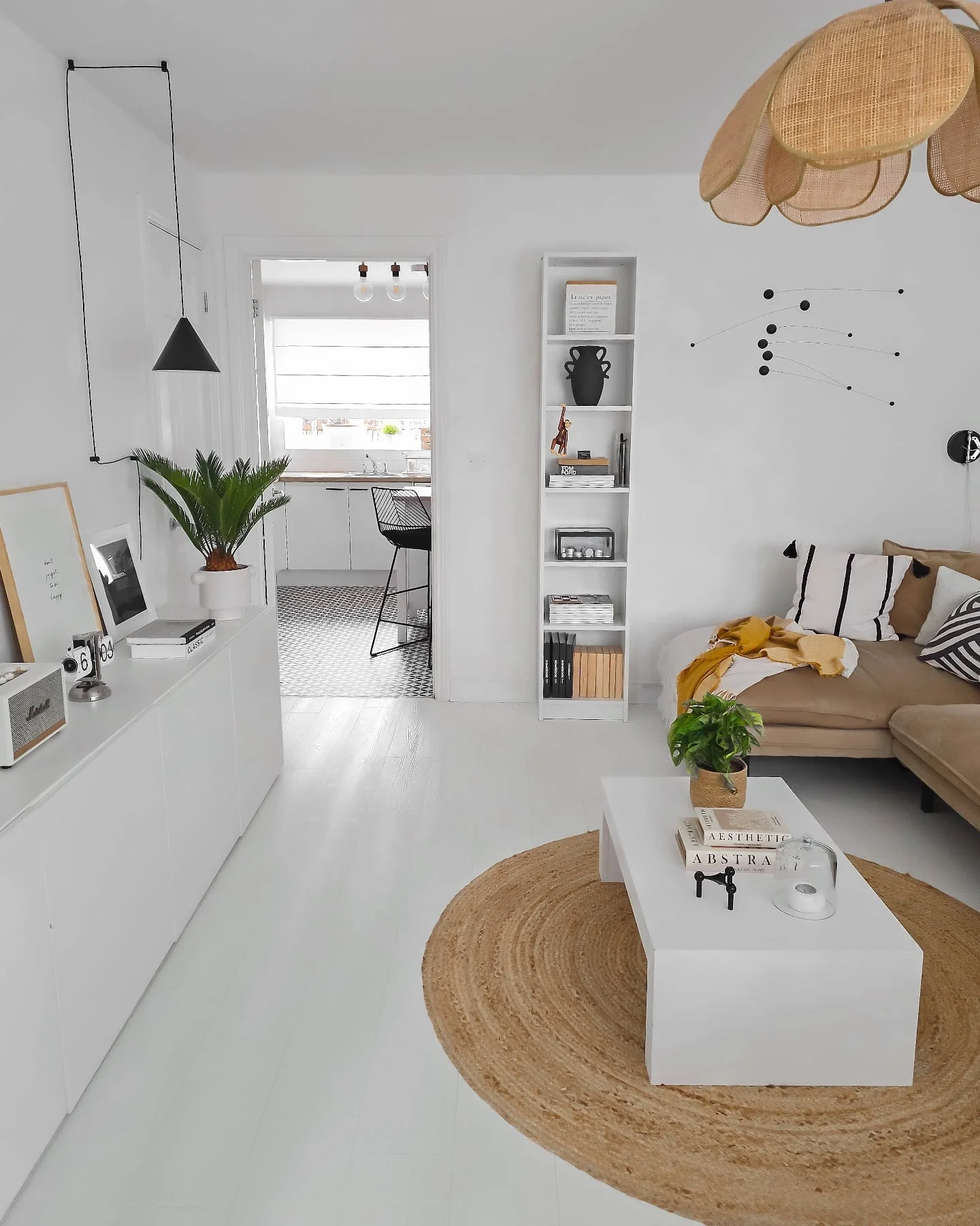 14. Scandinavian Charm with Playful Geometry (White Living Room Ideas)