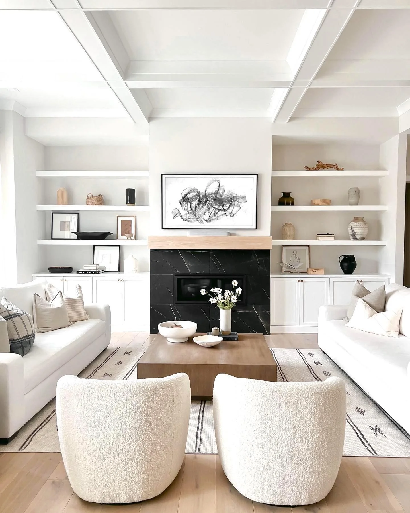 16. Modern Classic with High-Contrast Focal Point (White Living Room Ideas)