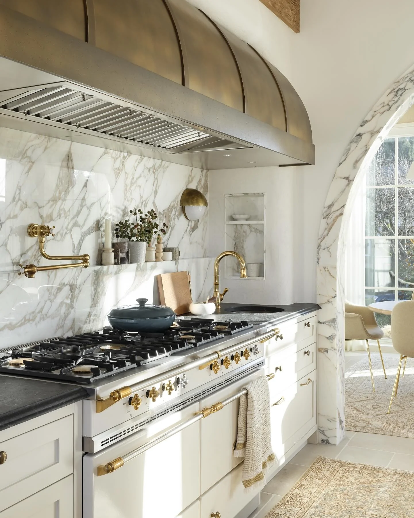 8. White and Gold with Statement Range Hood (Vintage Kitchen Ideas)