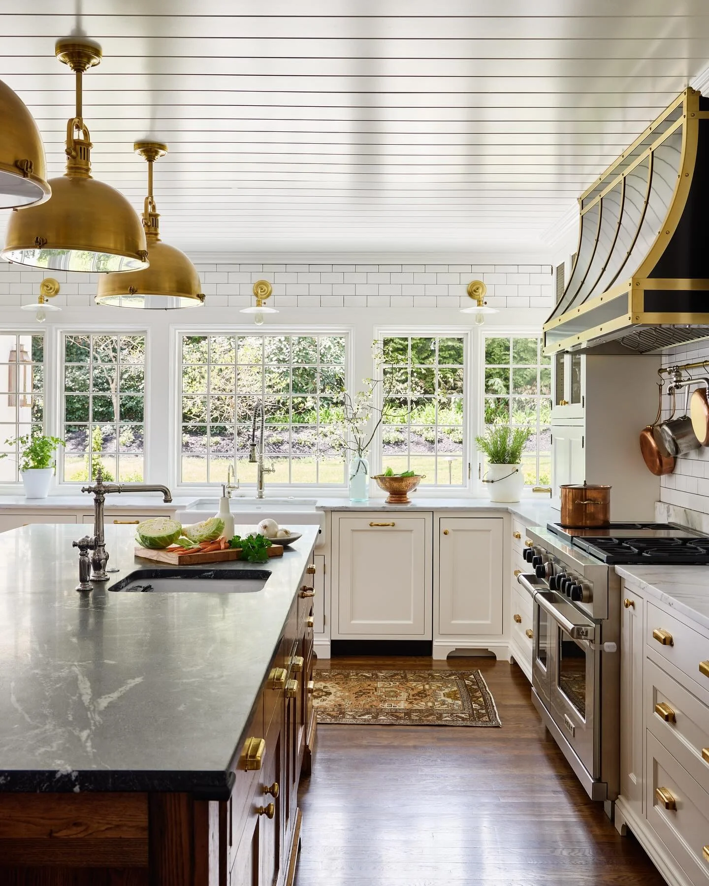 10. Brass Lanterns and Dark Stone Countertops (Vintage Kitchen Ideas)