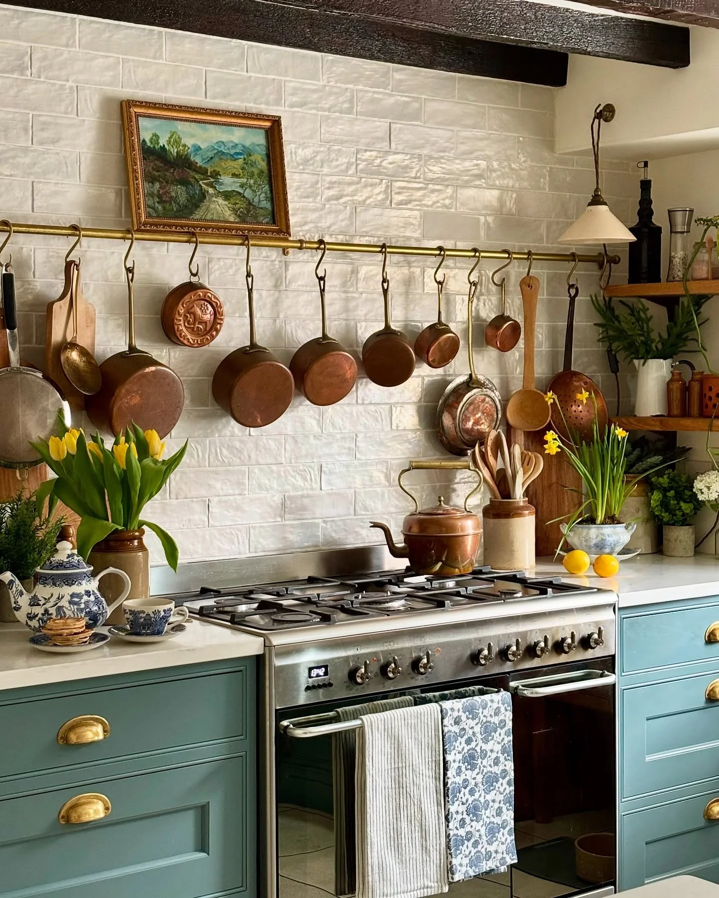 17. Copper Rail Accents and Blue-Green Cabinets (Vintage Kitchen Ideas)