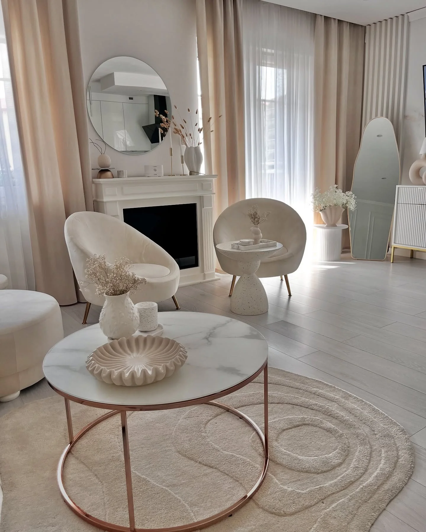 14. Soft Blush With Sculptural Forms (Cozy Living Room Ideas)