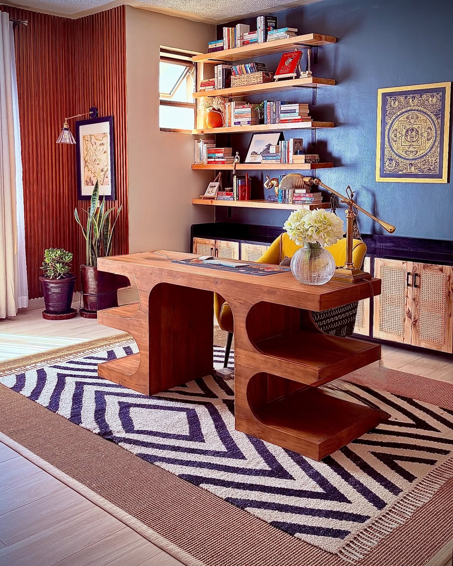 15. Creative Studio with Sculptural Desk and Patterned Rug (Masculine Home Office Ideas)