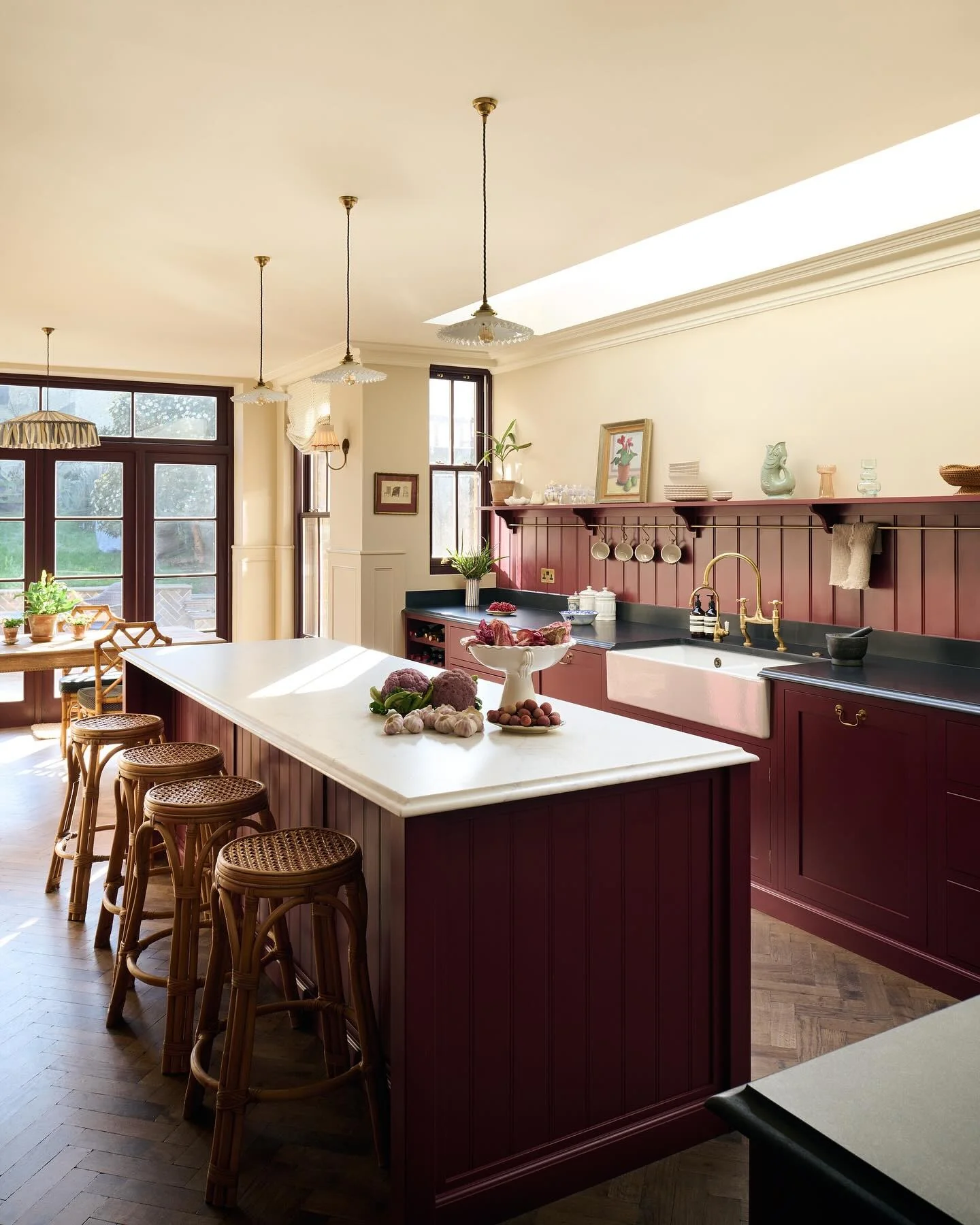 2. Plum Cabinets with English Cottage Charm (Dark Cabinets Kitchen Ideas)