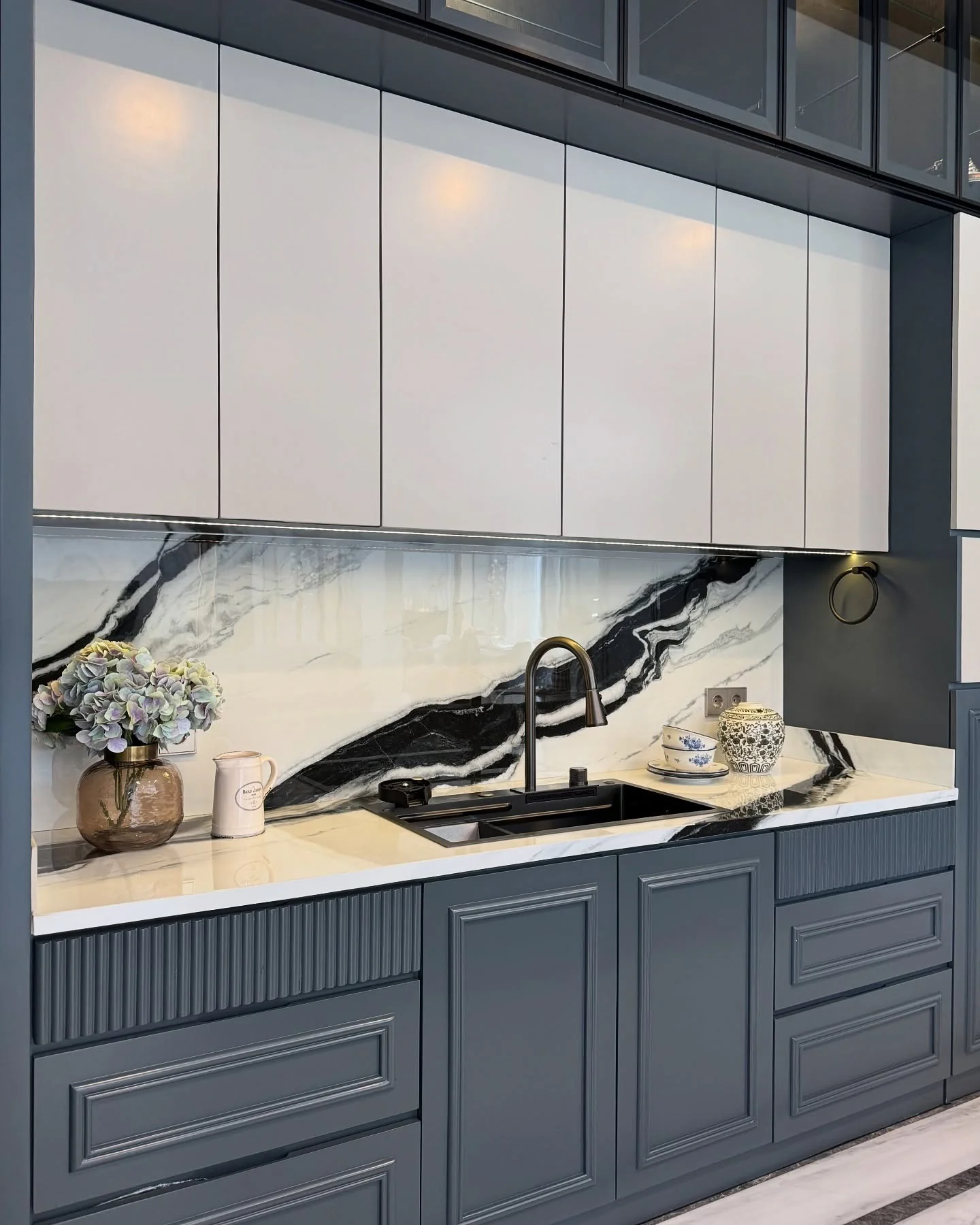 4. Monochrome Veined Marble with Deep Charcoal Frames (Dark Cabinets Kitchen Ideas)