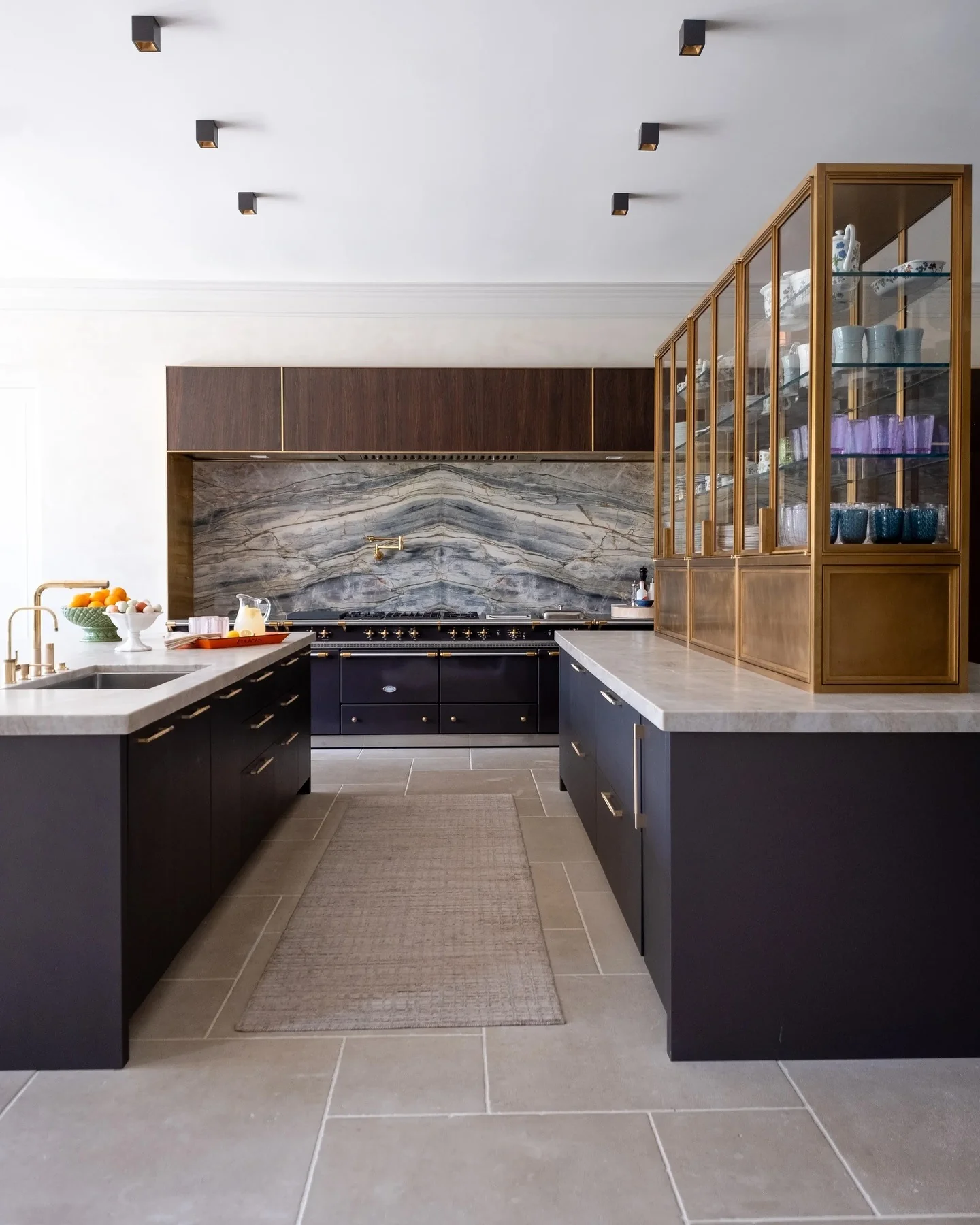 8. Matte Black and Walnut with Artistic Stone Statement (Dark Cabinets Kitchen Ideas)