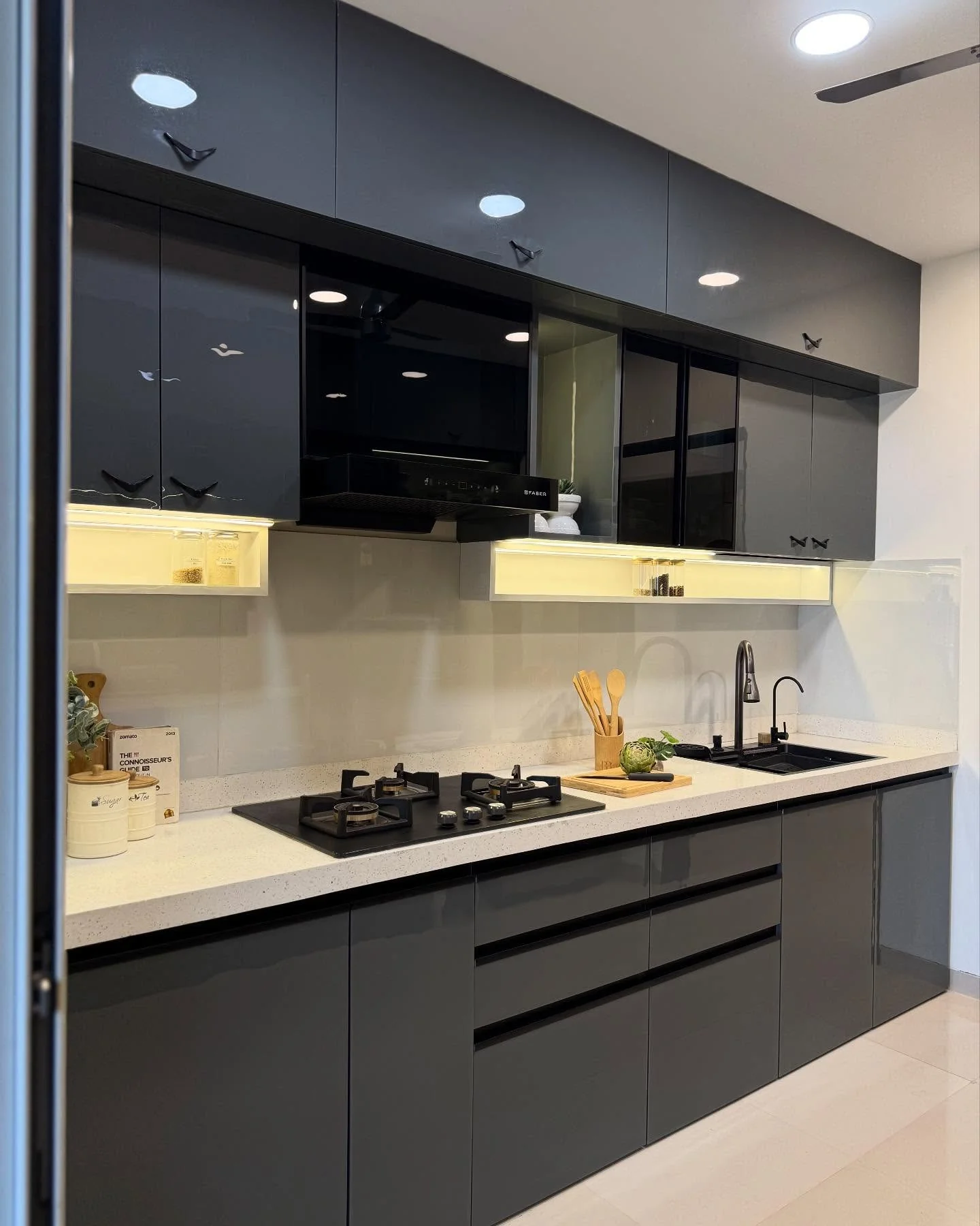 9. Midnight Gloss with Integrated Utility (Dark Cabinets Kitchen Ideas)