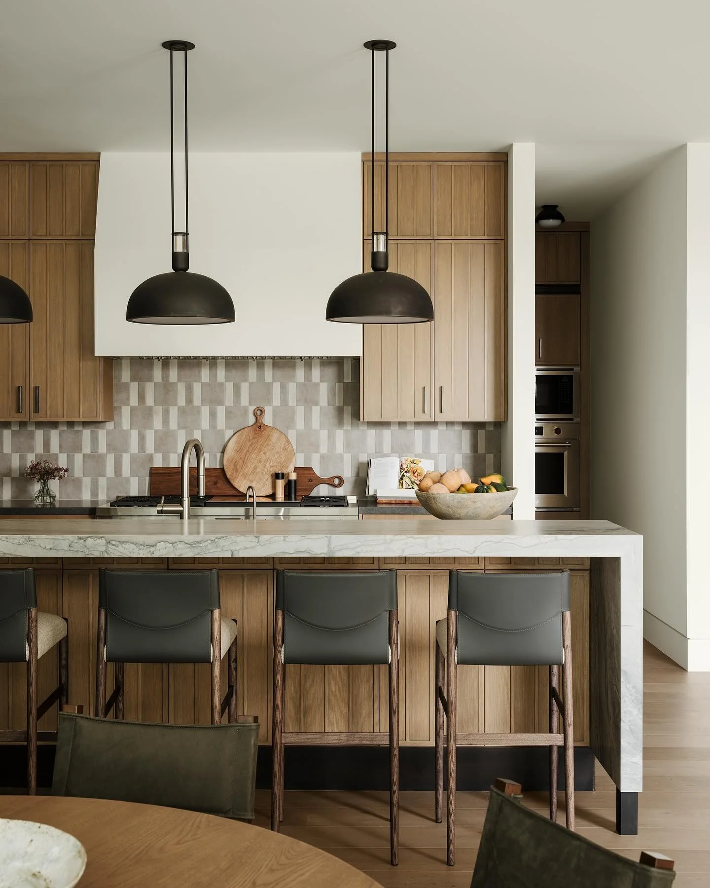 10. Modern Transitional with Geometric Backsplash (Brown Kitchen Cabinets Ideas)