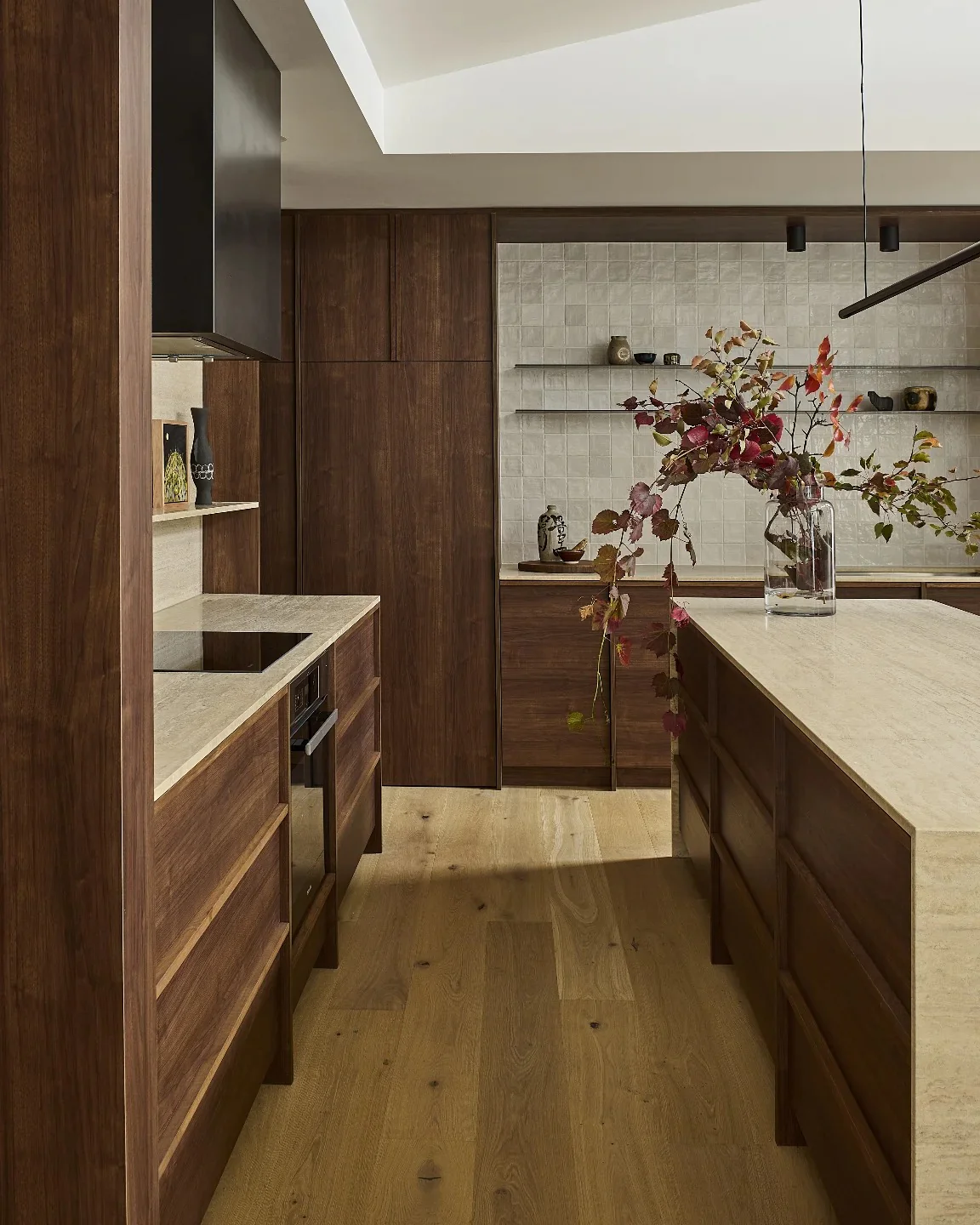17. Understated Modern with Rich Walnut Tones (Brown Kitchen Cabinets Ideas)