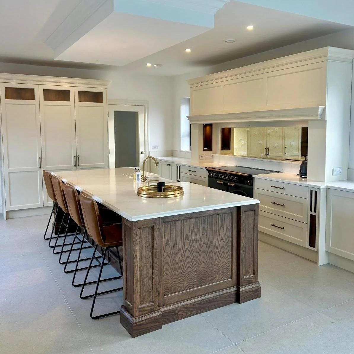 15. Two-Tone Transitional with Leather Seating (Garage Kitchen Ideas)