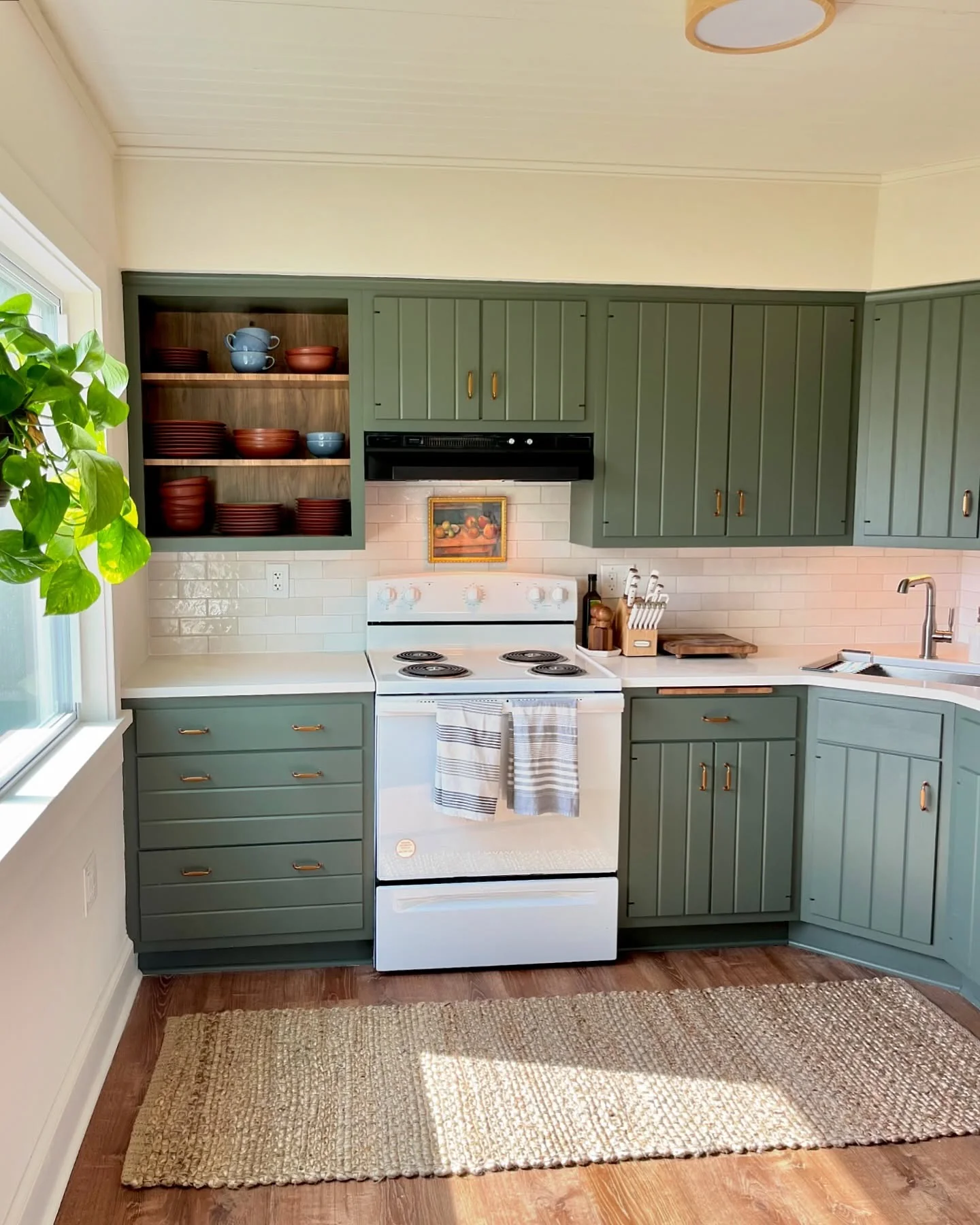 18. Sage Green with Open Shelving and Charm (Garage Kitchen Ideas)