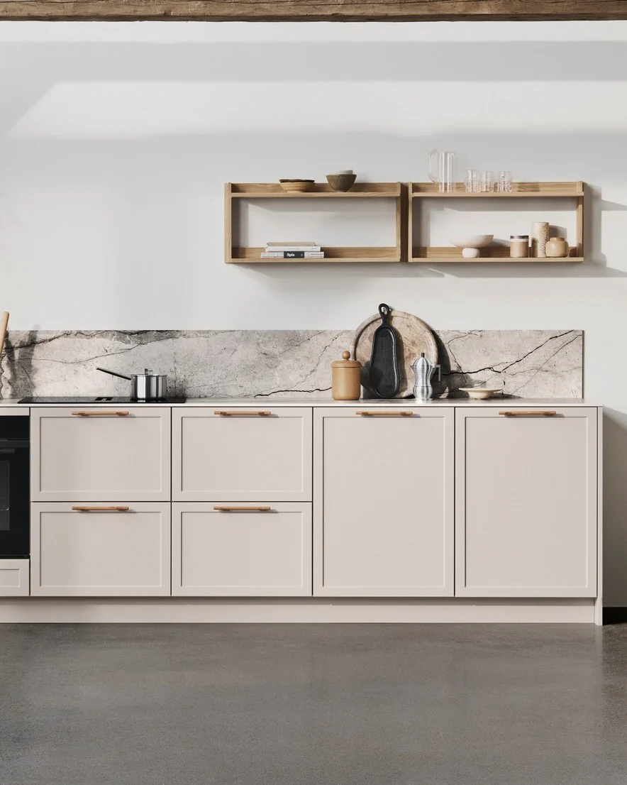 3. Minimalist Zen with Earthy Stone Accents (Beige Kitchen Ideas)