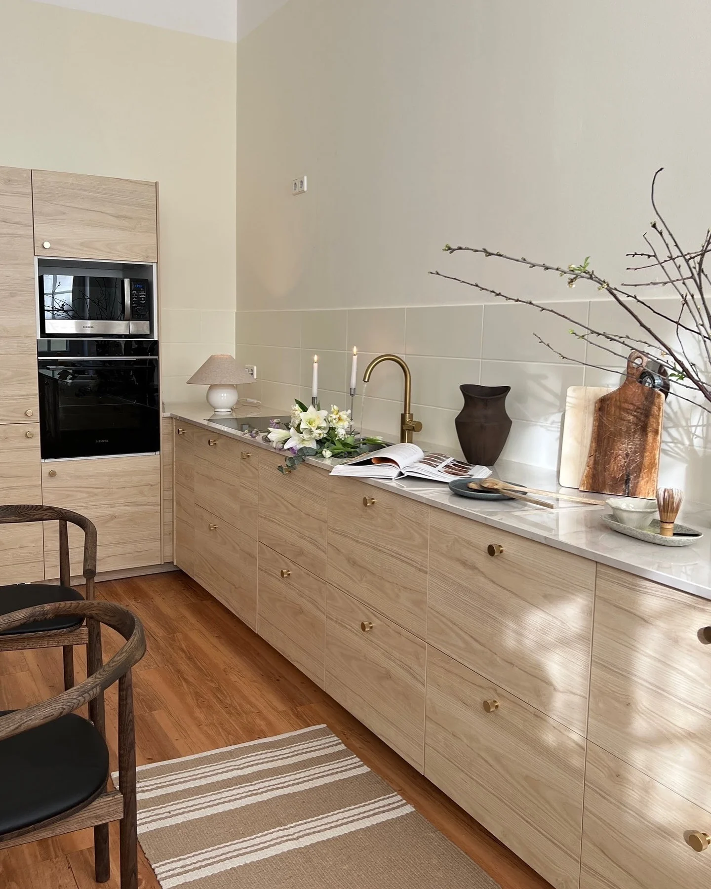 10. Natural Light and Scandinavian Softwood Harmony (Beige Kitchen Ideas)