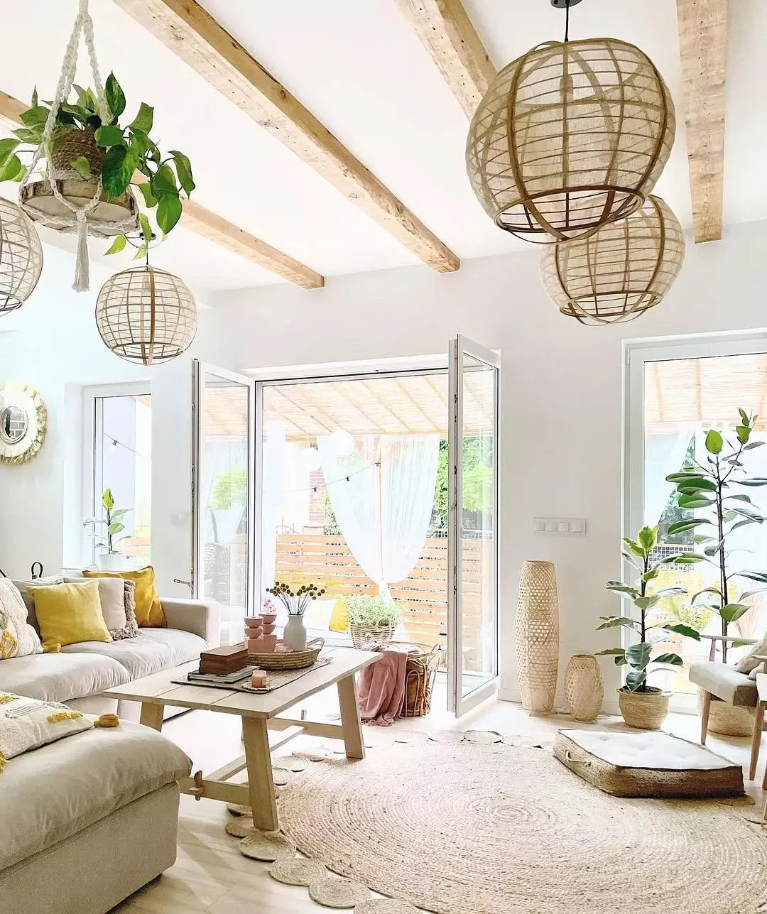 9. Scandi-Boho Fusion with Natural Light (Boho Living Room Ideas)