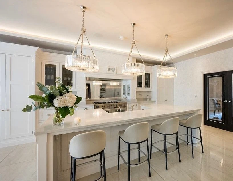 11. Elegant All-White Kitchen with Crystal Chandeliers (Modern Kitchen Ideas)