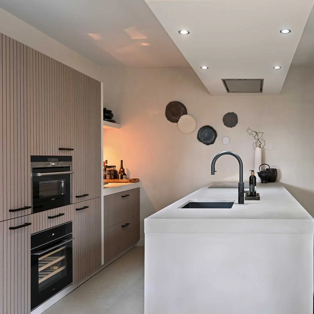 17. Sleek Earth-Toned Kitchen with Textured Paneling (Modern Kitchen Ideas)