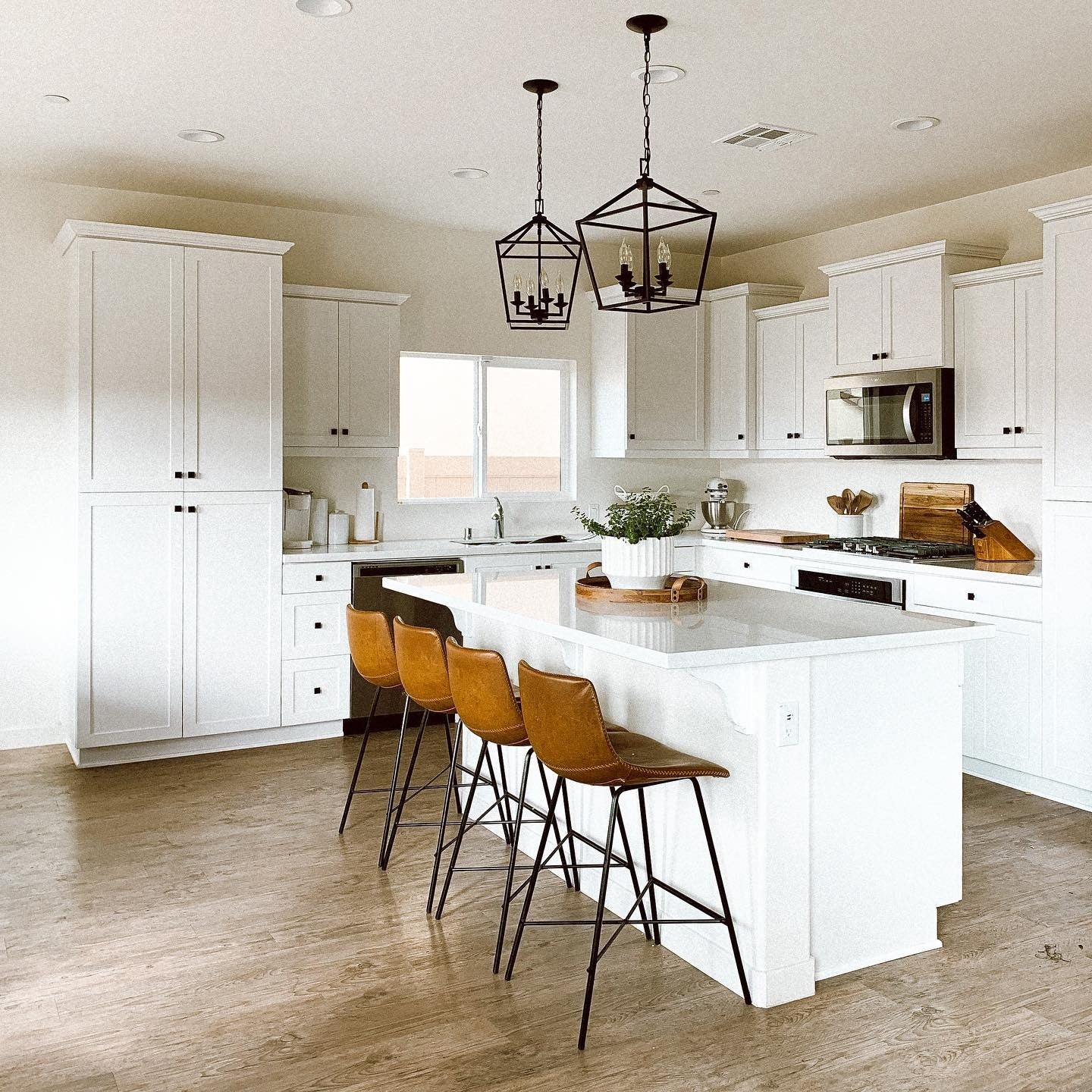 21. Bright White Farmhouse Kitchen with Rustic Warmth (Modern Kitchen Ideas)