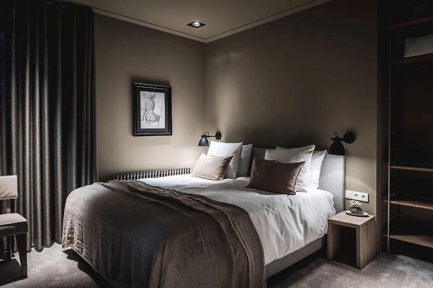 6. Understated Earth Tones (Moody Bedroom Ideas)