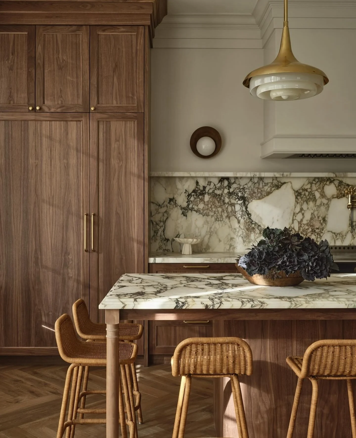 9. Dramatic Marble and Warm Walnut Harmony (Brown Kitchen Ideas)