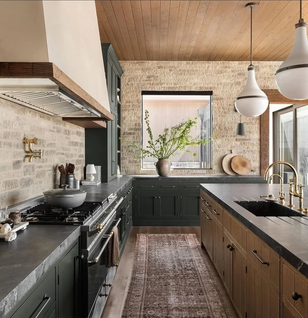 15. Earthy Elegance with Textured Brick and Olive Brown (Brown Kitchen Ideas)