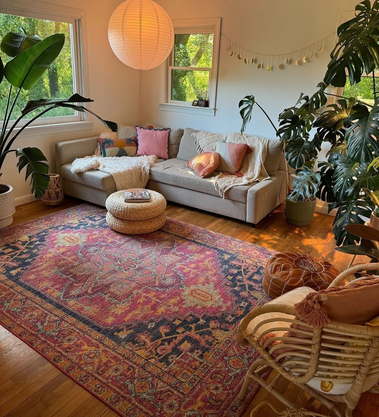 2. Bohemian Bloom with Sunset Tones (Earth Tones Living Room Ideas)