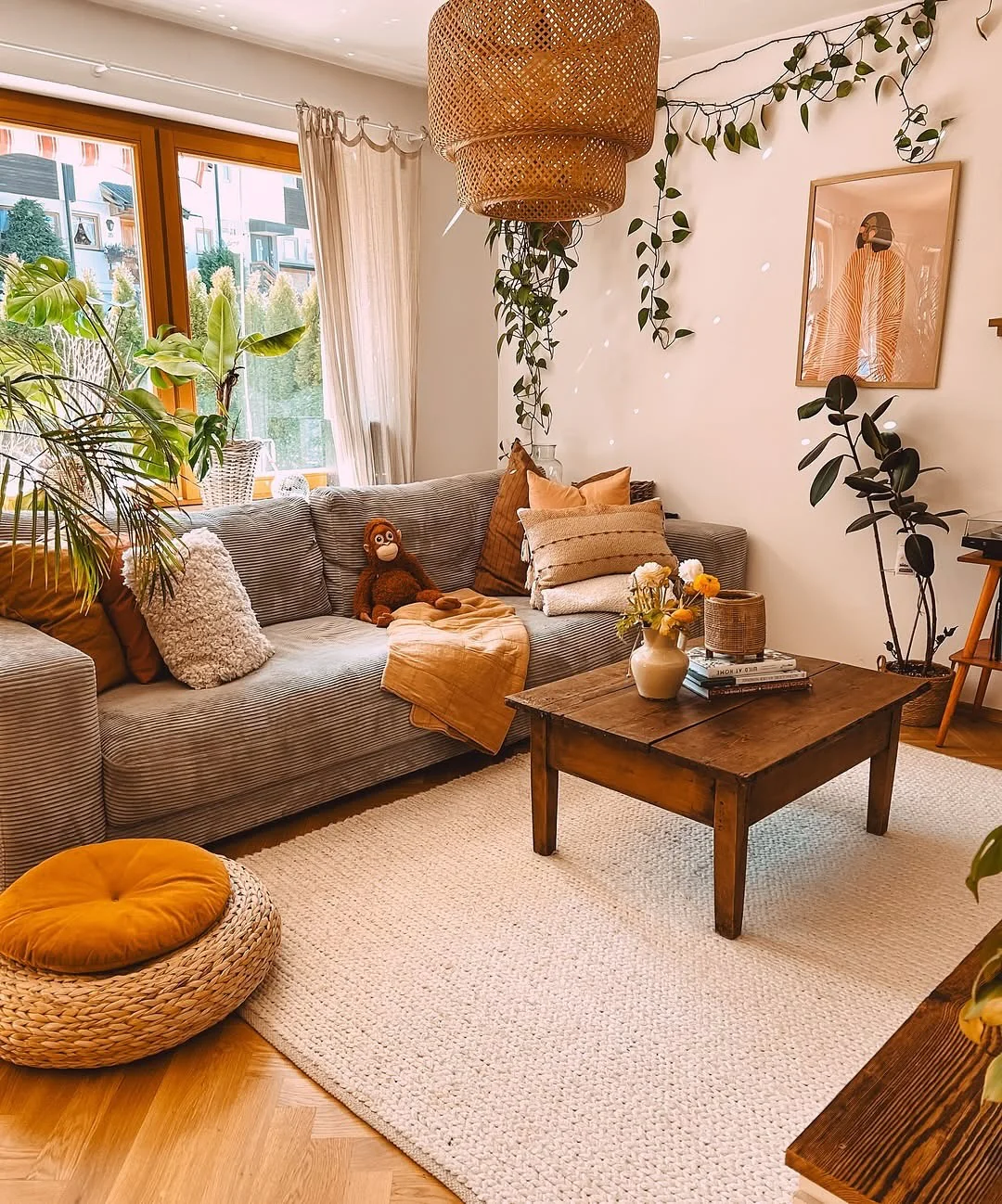 23. Sunlit Boho Charm in Amber and Clay (Earth Tones Living Room Ideas)