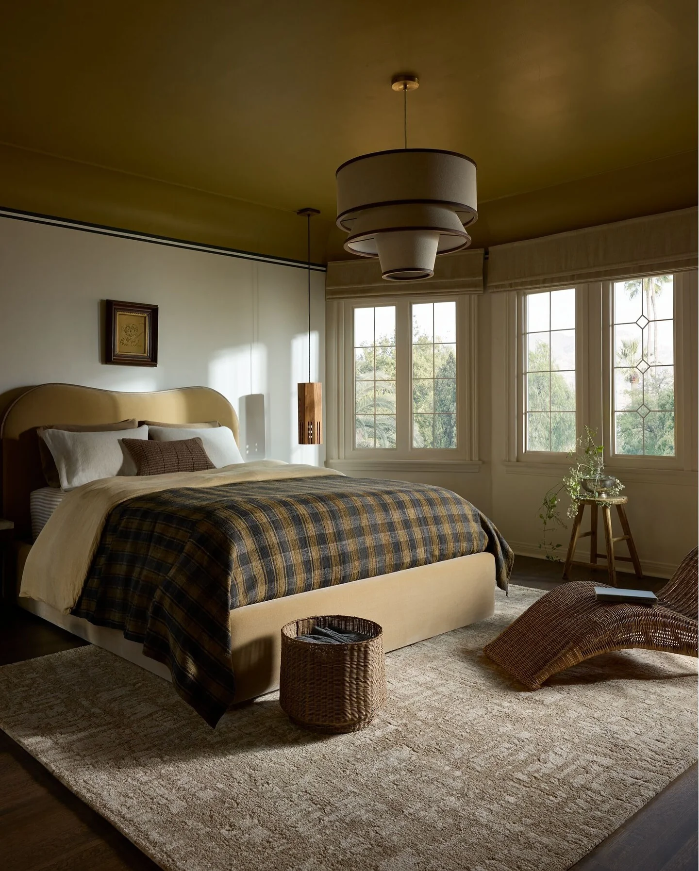 2. Olive Sophistication in a Mid-Century Shell (Earth Tones Bedroom Ideas)