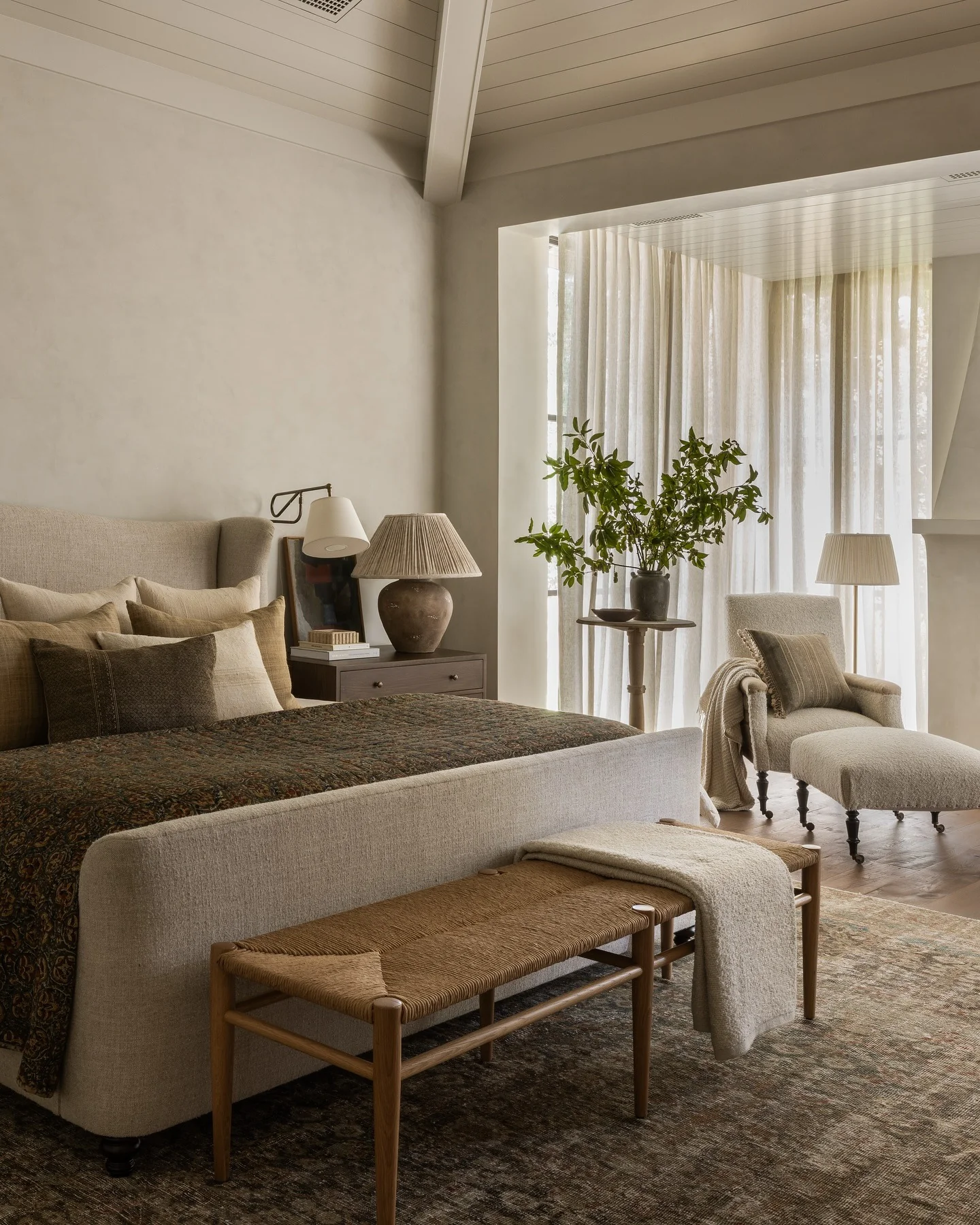 7. Layered Neutrals with Rustic Green Accents (Earth Tones Bedroom Ideas)