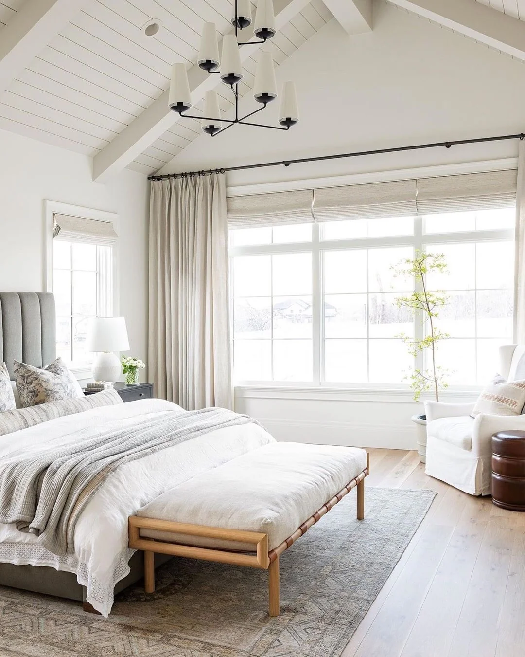 3. Transitional Comfort in Natural Light (White Bedroom Ideas)