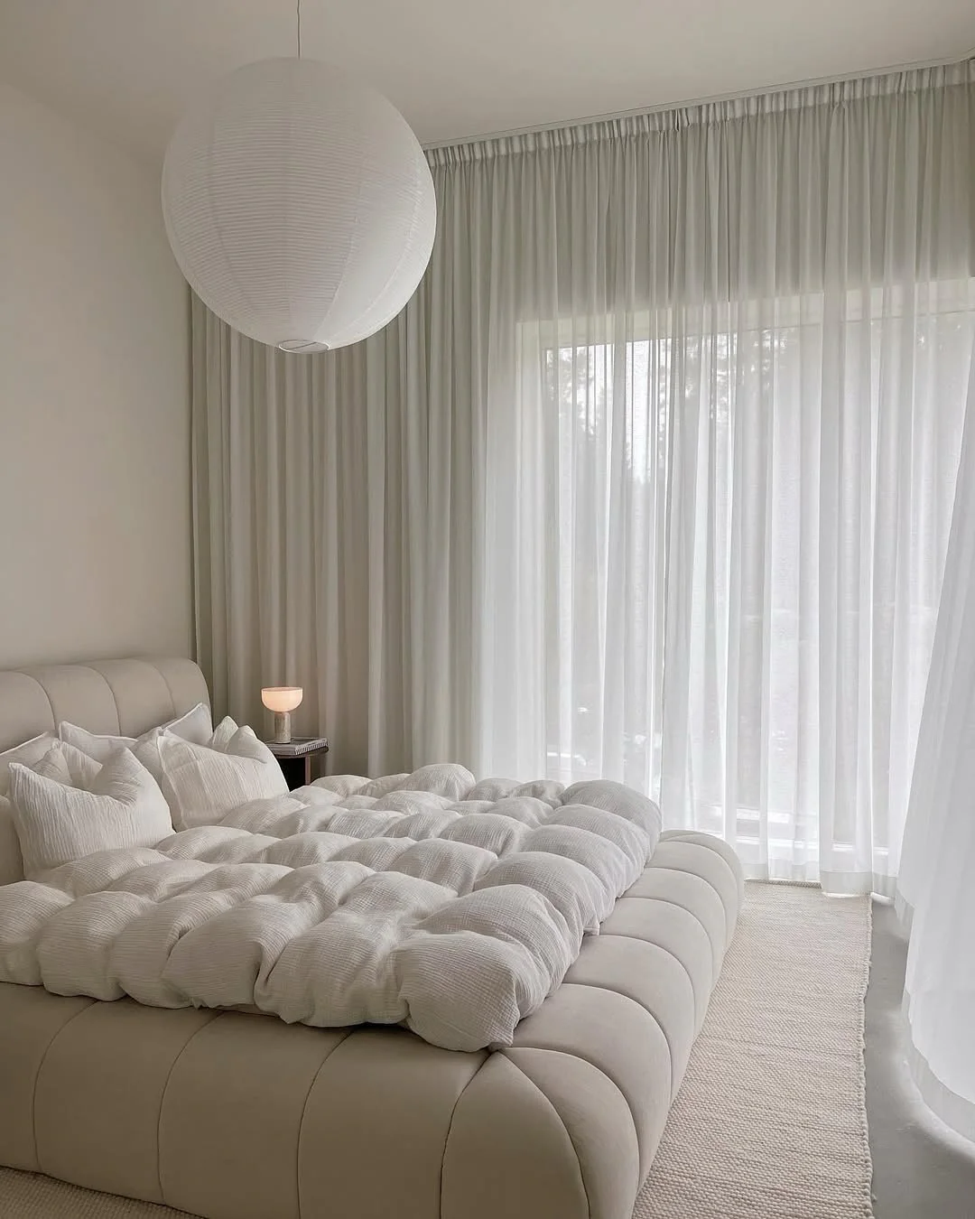 11. Cloud-Like Minimalism with Sheer Elegance (White Bedroom Ideas)