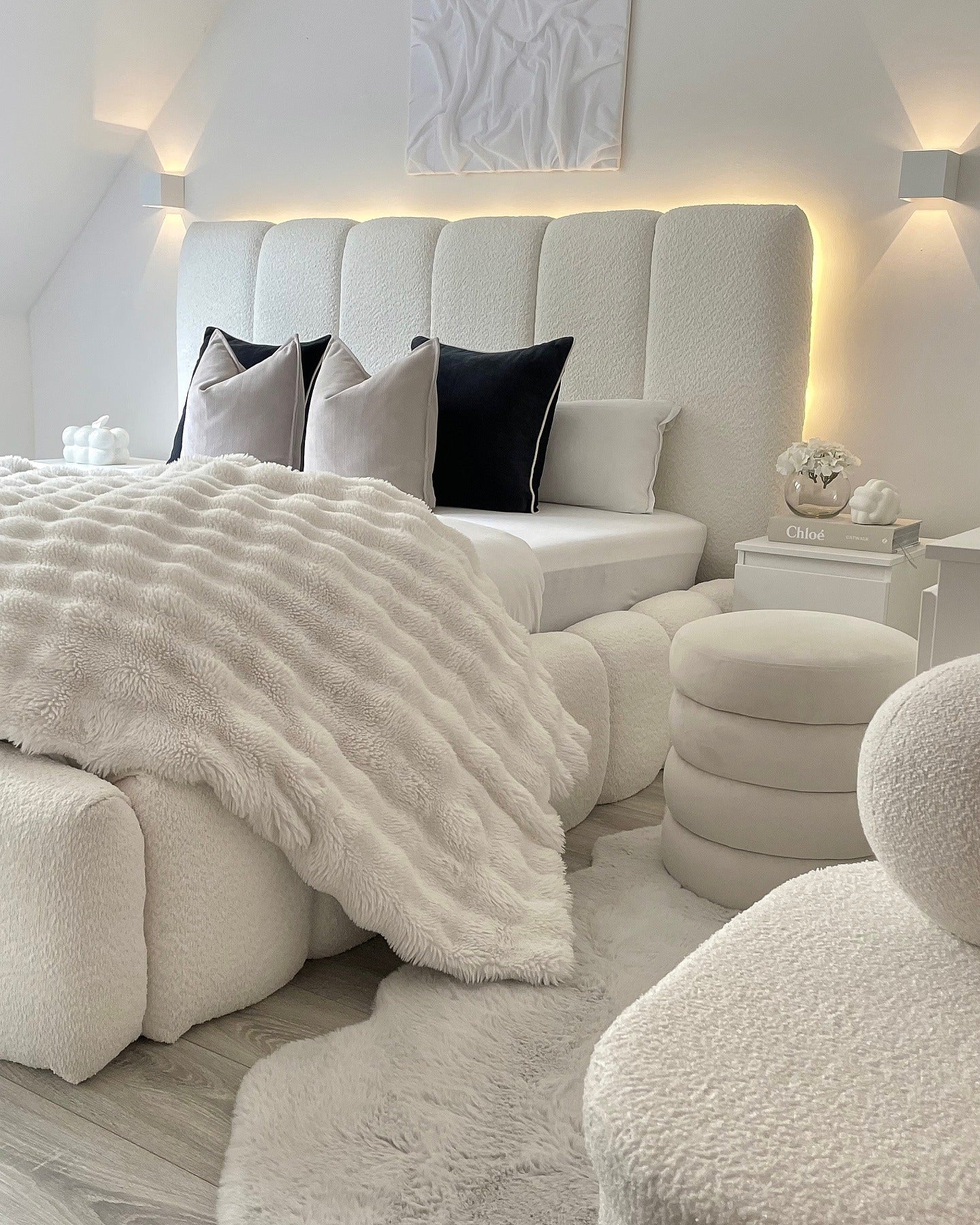 12. Textural Glamour in White BouclÃ© (White Bedroom Ideas)