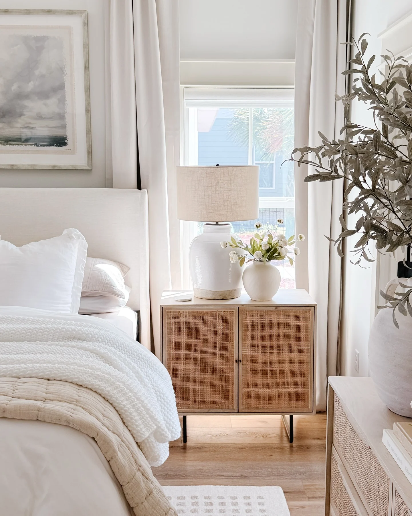 15. Coastal Organic with Rattan Accents (White Bedroom Ideas)