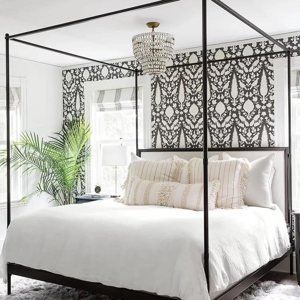 17. Bold Contrast with Classic Canopy (White Bedroom Ideas)