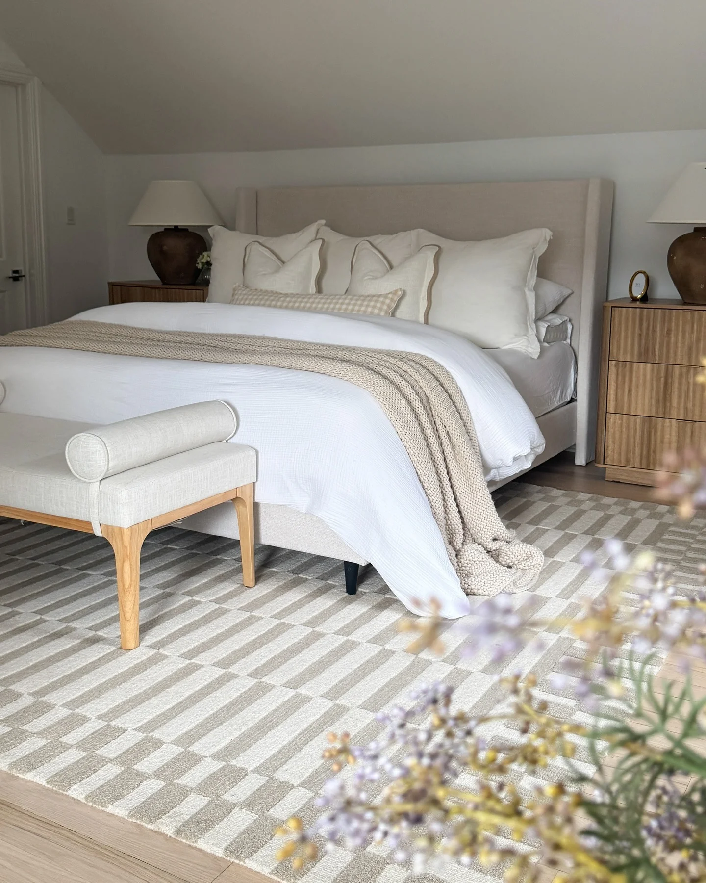 22. Crisp Neutrals with Quiet Geometry (White Bedroom Ideas)