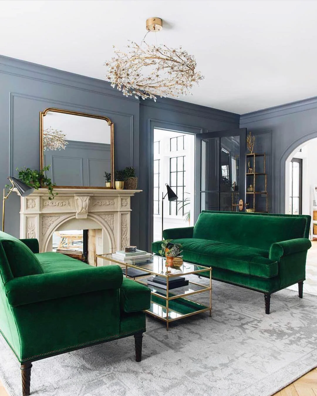 4. Dramatic Elegance: Emerald Velvet Seating with Gold & Slate Blue (Emerald Green and Gold Living Room Ideas)
