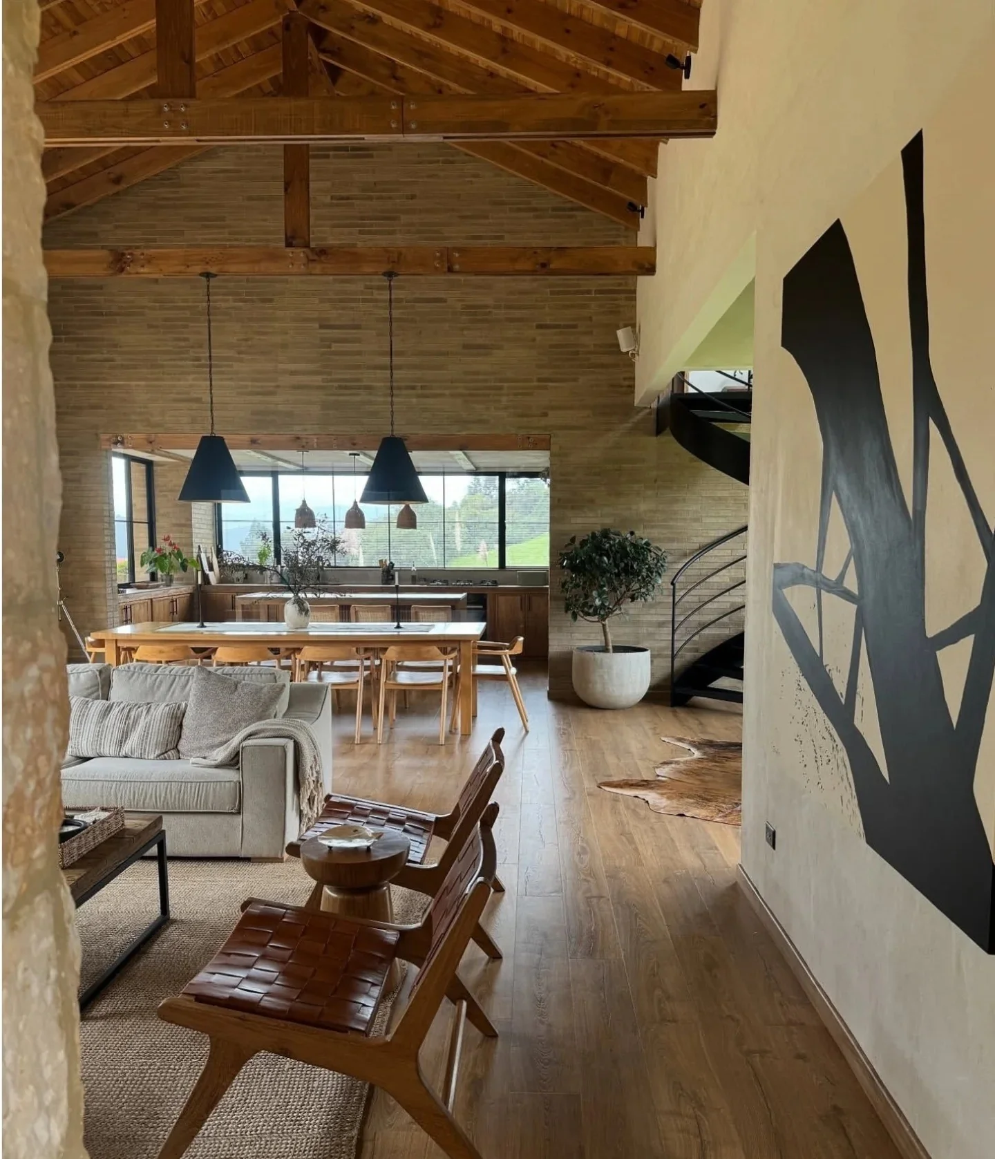 2. Rustic Elegance with Contemporary Lines (Open Concept Living Room Ideas)