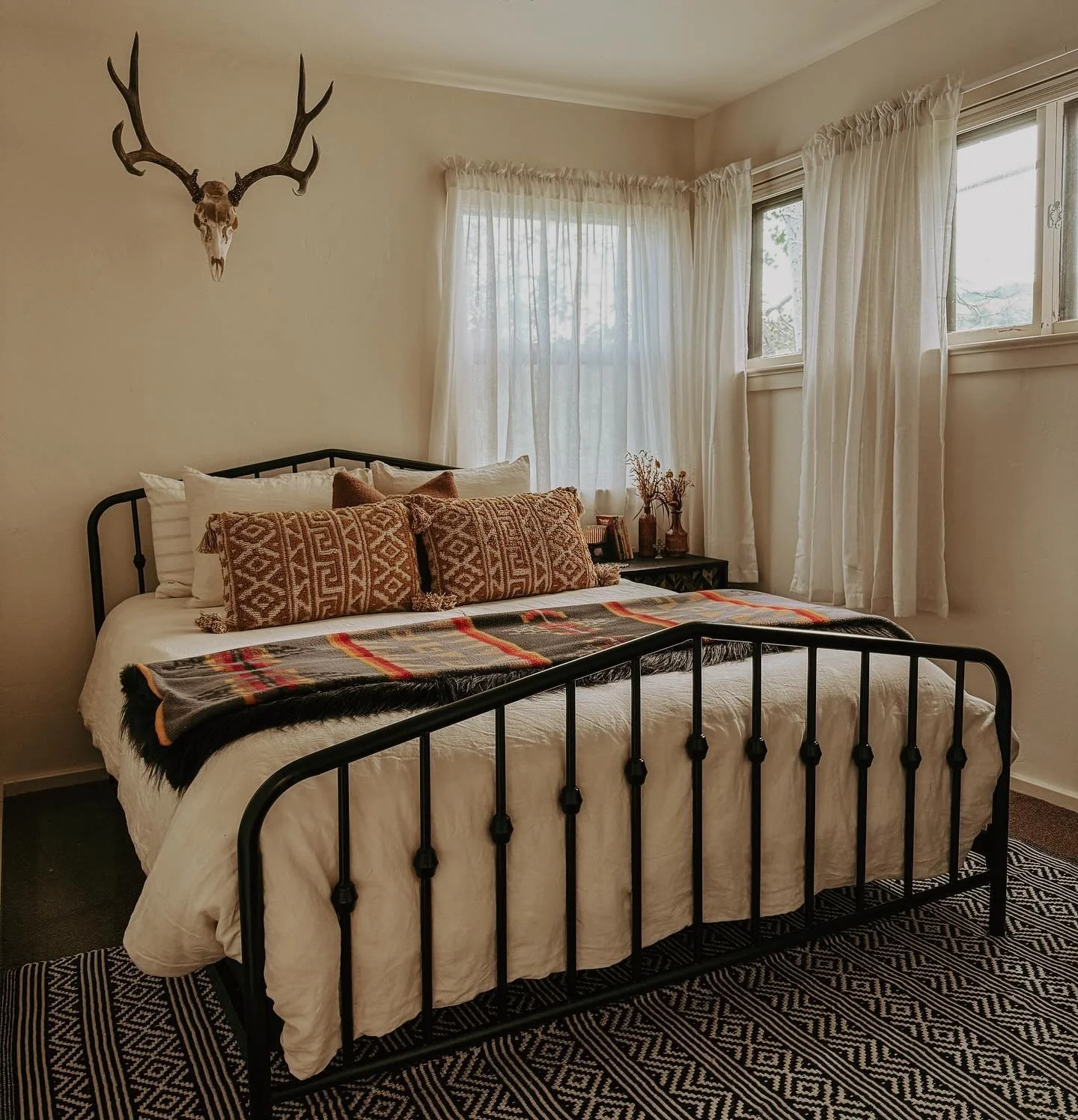1. Soft Western Neutrals with Iron Accents (Cowgirl Bedroom Ideas)